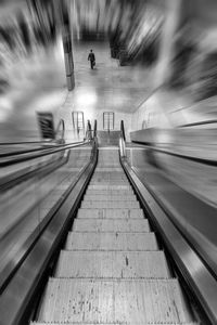 People walking on railroad station platform