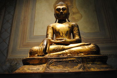 Low angle view of buddha statue