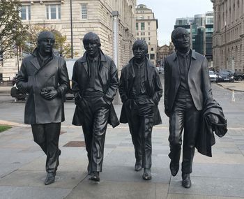 People walking on street in city