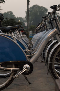 Close-up of bicycle parked on road