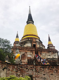 Low angle view of temple building against sky