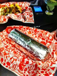 Close-up of red object on table