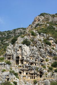 Buildings against mountain