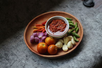 High angle view of fruits in bowl on table