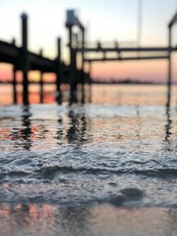 Close-up of swimming pool by sea against sky