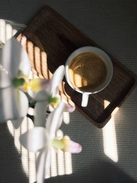 High angle view of coffee cup on table