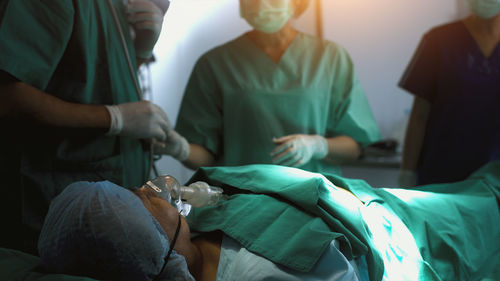 High angle view of business people working at clinic