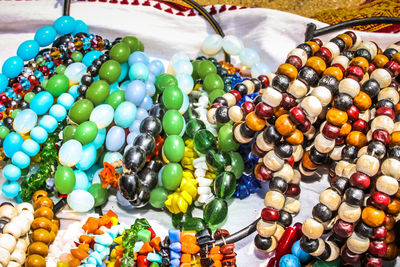 Close-up of multi colored jewelry for sale