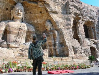 High five with buddha