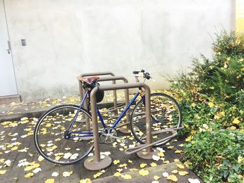 Bicycle parked on street in city