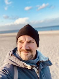 Portrait of mid adult man on beach