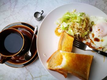 High angle view of breakfast served on table