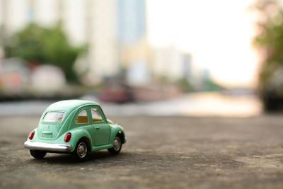 Close-up of toy car on road