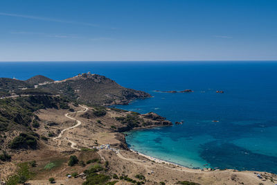 Scenic view of sea against clear blue sky