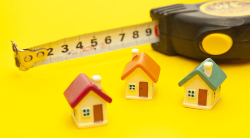 High angle view of yellow toy on building