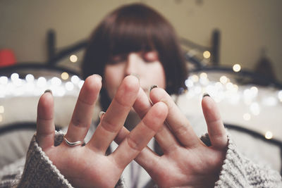 Portrait of woman with hands