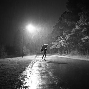 Man walking on road