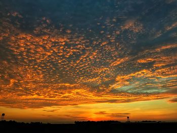 Scenic view of dramatic sky during sunrise