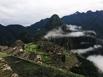 High angle view of old ruins at machu picchu against sky