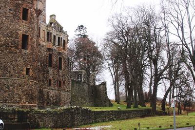 Trees in front of built structure