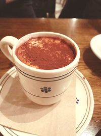 Close-up of coffee cup on table