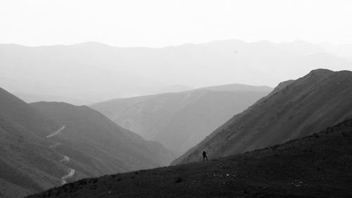 Scenic view of mountains during foggy weather