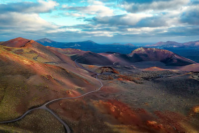 Scenic view of landscape and mountains against sky