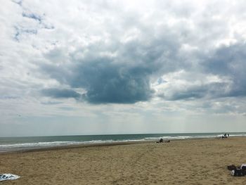 Scenic view of beach against sky