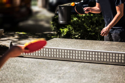 People playing table tennis