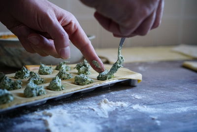 Close-up of person preparing food