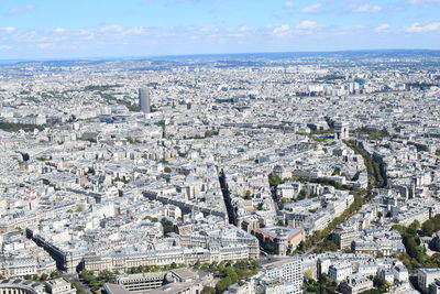 High angle view of city against cloudy sky