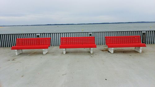 Empty chairs in the sea