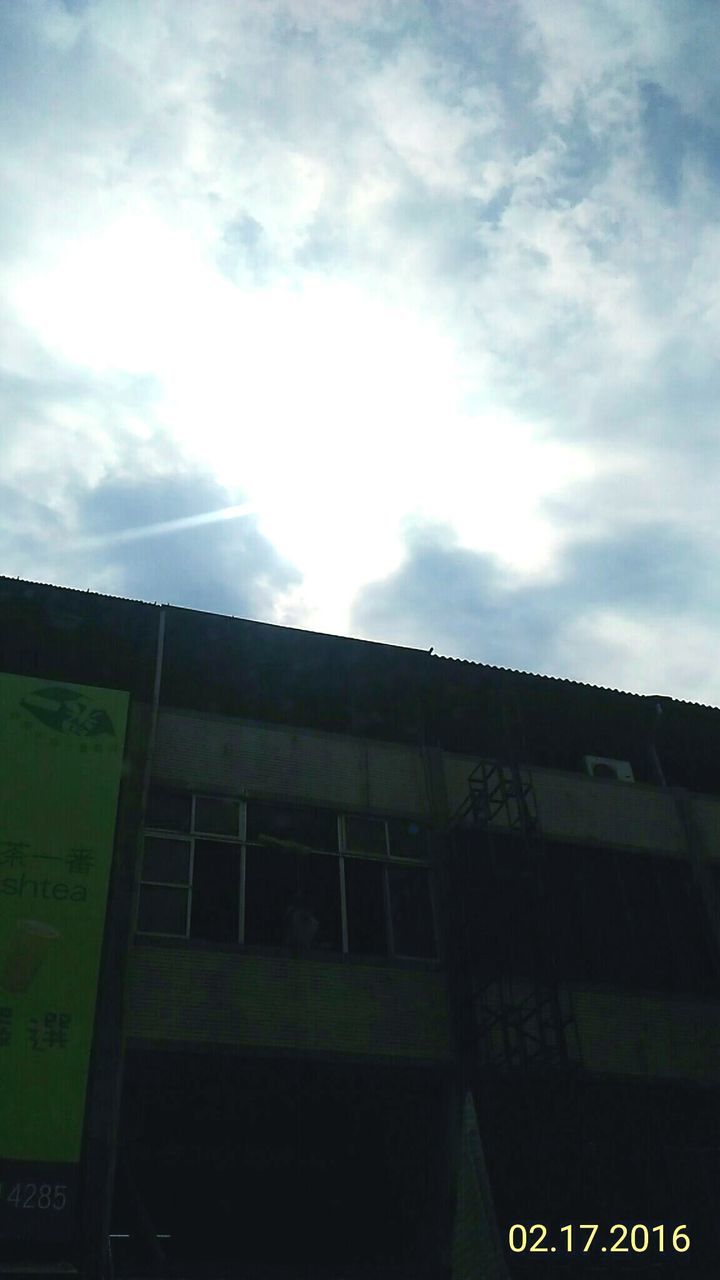 LOW ANGLE VIEW OF BUILT STRUCTURE AGAINST THE SKY