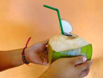 Close-up of hand holding fruit