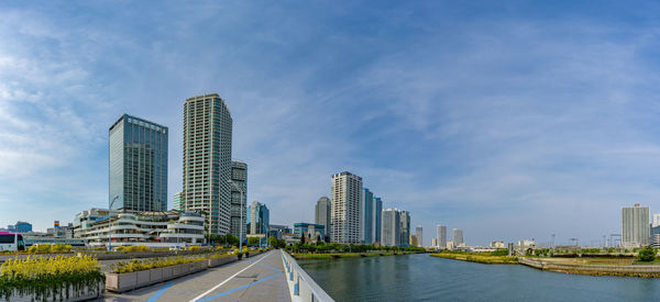 Modern buildings in city against sky