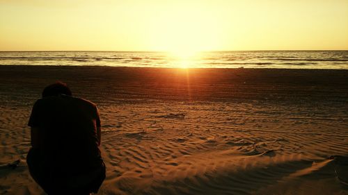 Scenic view of sea at sunset