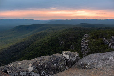 Scenic view of landscape against sky during sunset