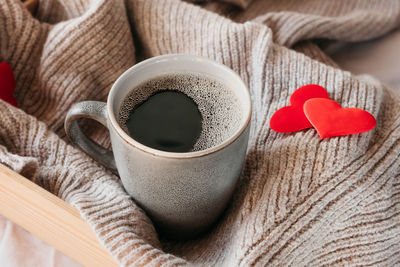 Close-up of coffee cup on table