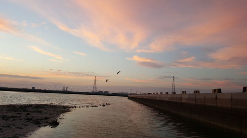 Scenic view of sea at sunset