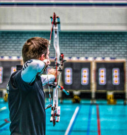 Side view of indoor compound archer