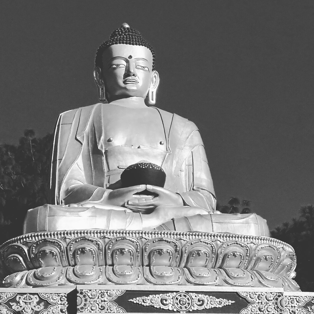 religion, human representation, spirituality, statue, buddha, sculpture, low angle view, art and craft, place of worship, temple - building, travel destinations, idol, sky, outdoors, famous place, large, creativity, golden color, memories, malaysian culture, temple