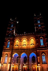 Low angle view of illuminated built structure