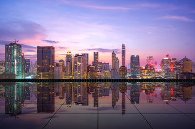 Modern buildings in city against sky