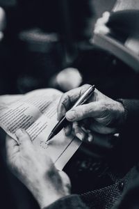 Close-up of man holding hands