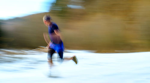 Full length of man running