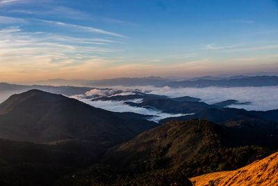 Scenic view of mountains against sky during sunset