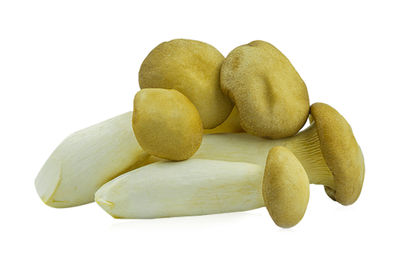 Close-up of bananas against white background