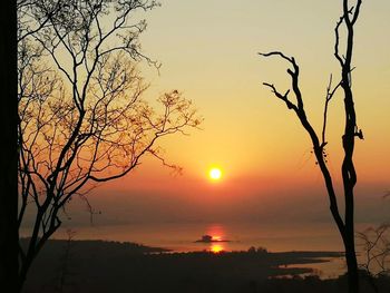 Scenic view of landscape against sky during sunset