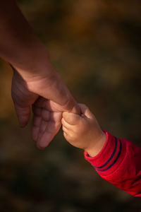 Close-up of hands against blurred background