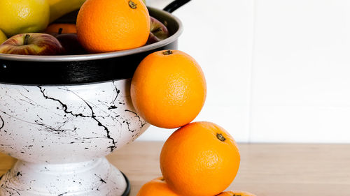 High angle view of oranges in bowl on table